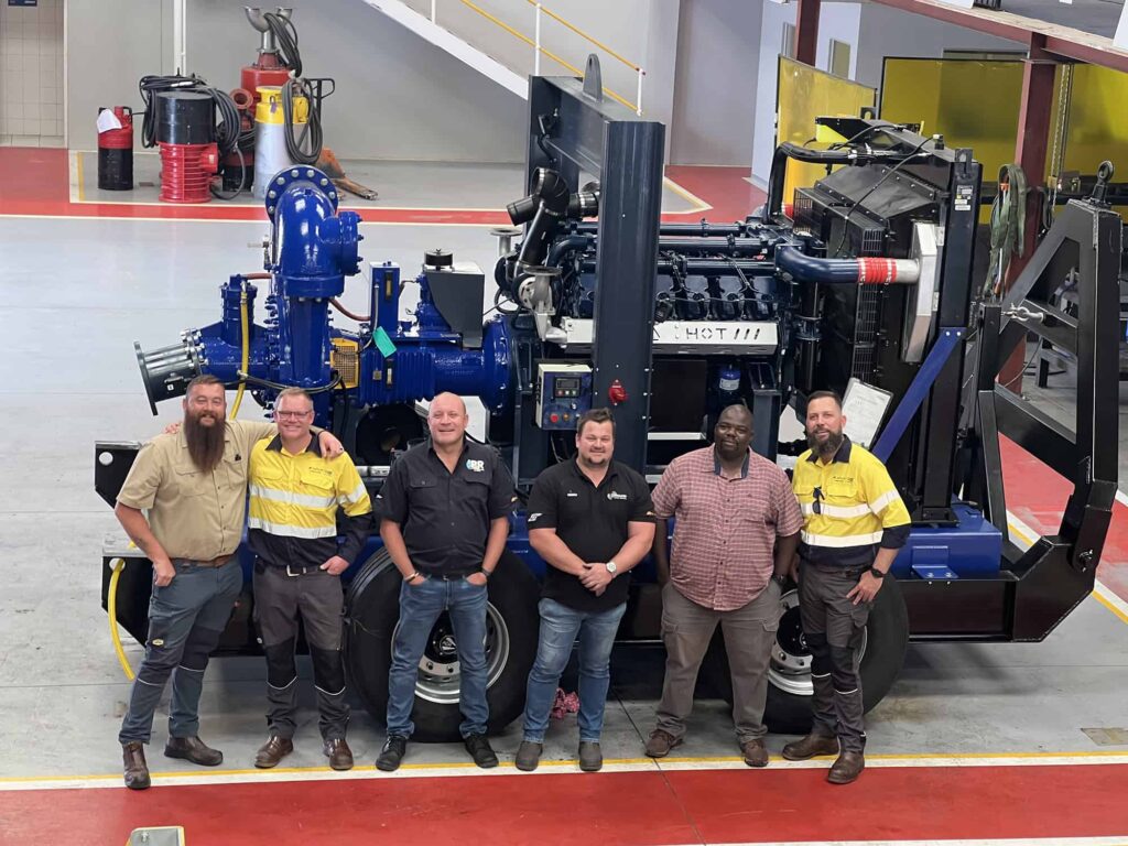 The IPR team prior to the pump leaving the company's facility in Jet Park.