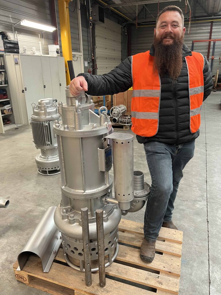 Ruaan Venter, Business Development Manager at IPR, with a high depth Toyo slurry pump capable of submergence up to minus 120 m.